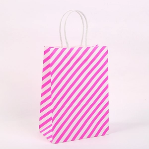Pink and white diagonal striped kraft paper gift bag with durable white twisted rope handles