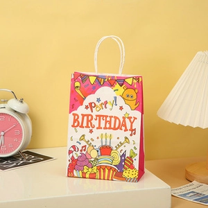 Pink birthday gift paper bag with cute cartoon monster and cake illustrations for kids