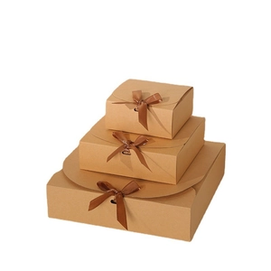 Three-piece square kraft paper gift box set with elegant dark brown satin ribbon bows