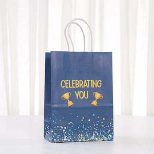 Dark blue Celebrating You gift bag with gold foil details and confetti dot pattern