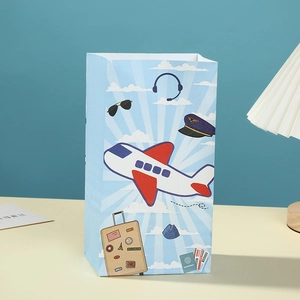 Cartoon aviation themed light blue paper gift bag with airplane and pilot patterns