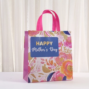 Laminated non-woven Mother's Day gift bag with floral prints and pink handles