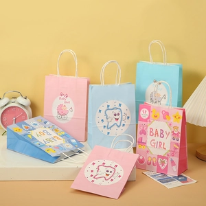 Detail of baby shower gift bags with twist handles and cute cartoon nursery patterns
