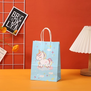 Light blue unicorn paper gift bag with white rope handles for birthday party packaging