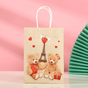 Kraft paper gift bag with cute teddy bears, heart motifs and Eiffel Tower prints
