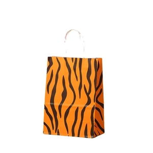 Papiertüte mit Tigerstreifen und weißen Tragegriffen für Partygeschenke und Feiertage