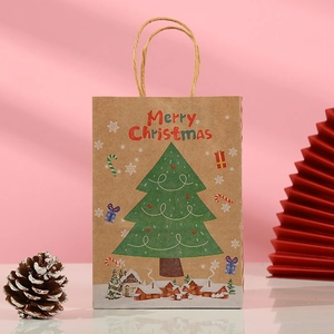 Christmas kraft paper gift bag with green tree print and red Merry Christmas text
