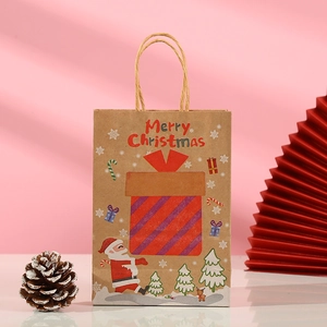 Christmas Kraft paper gift bag with red Merry Christmas text and festive tree graphics