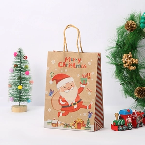Detail of Christmas kraft paper gift bag with Merry Christmas text and festive patterns