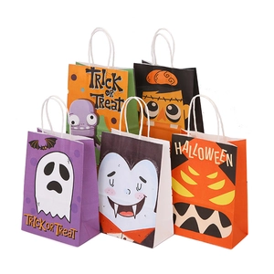 Halloween kraft paper gift bags with spooky ghost and pumpkin designs for trick or treat
