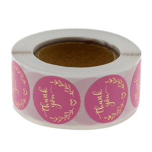 Roze Thank You bruiloft stickers met goudfolie op een rol voor cadeauverpakkingen