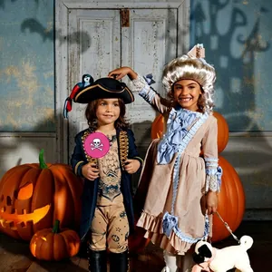 Halloween pirate and baroque kids costumes with pumpkin decor and bat shadows