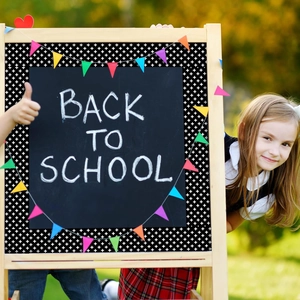 Detailed black bulletin board border stickers with white cross pattern for school decor