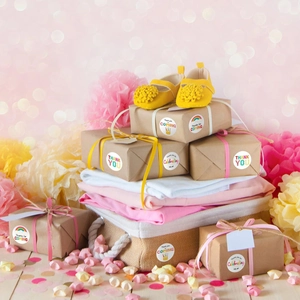 Rainbow Thank You stickers for baby shower favors on a gift box with cute illustrations
