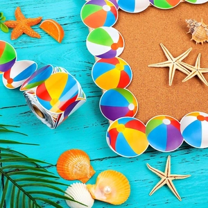 Colorful beach ball bulletin board border stickers on blue wooden background with starfish
