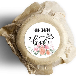 Floral Handmade with Love stickers on kraft paper packaging for handmade products