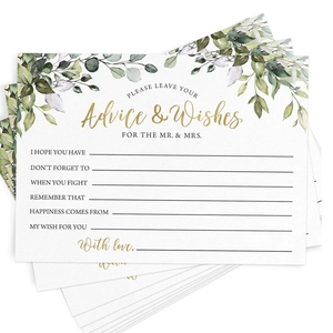 Détail de cartes de vœux mariage eucalyptus avec écriture dorée sur papier blanc