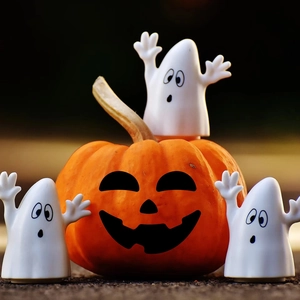 Halloween DIY pumpkin stickers set with spooky facial expressions and ghost figurines
