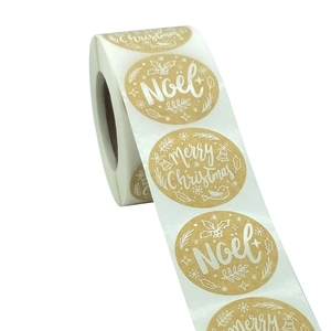 Brown kraft paper Merry Christmas stickers roll with white Noel and snowflake designs