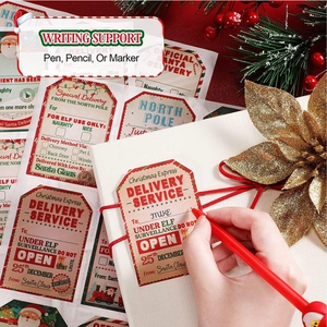 Close-up of Christmas gift tags with North Pole designs on festive red and white gift box