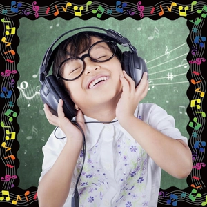 Close-up of music-themed bulletin border with black headphones and glasses for school