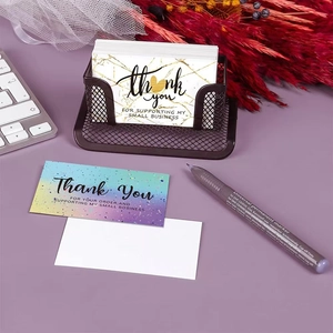 Elegant thank you cards set with marble and galaxy patterns in a mesh card holder