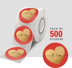 Close-up of red heart stickers with gold foil and with love text 500 count roll