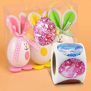 Colorful laser glitter Easter egg stickers on a roll for festive holiday decorations