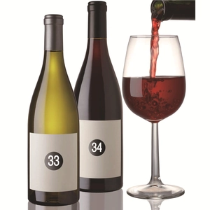 Macro detail of waterproof PVC number stickers 33 and 34 on elegant wine bottles