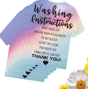 Detailed T-shirt shaped washing instruction cards with purple starry gradient design