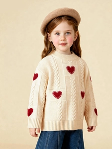 Winter girls' beige knit sweater with red heart patterns and classic cable stitch texture