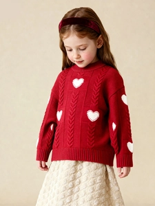 Girls' red festive knit sweater with white heart pattern and cable knit texture