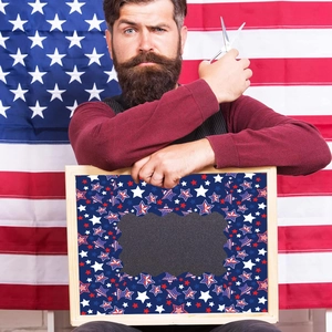 Independence Day blackboard frame with star patterns and wavy borders for festive decor
