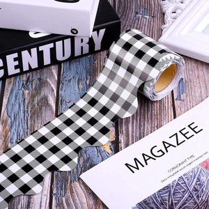Scalloped black and white checkerboard border trim sticker for classroom bulletin boards