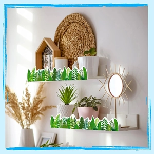 Tropical rainforest leaf stickers used as decorative border on classroom wall shelves