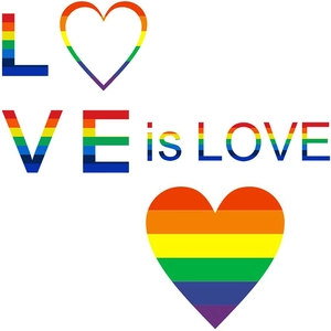 Macro detail of rainbow heart stickers featuring Love is Love text for Valentine decor