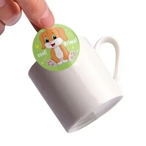 Round cartoon bunny reward stickers for kids with cool and prima text on white mug