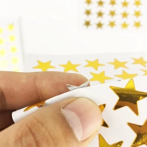 Golden foil star stickers for kids rewards with shiny metallic mirror finish