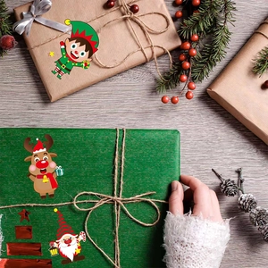 DIY Christmas stickers with Santa and reindeer on gift boxes for festive decoration