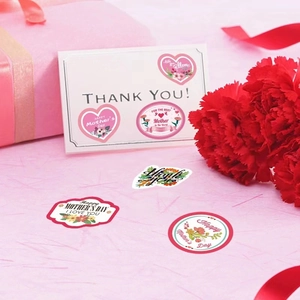 Pink Mother's Day stickers with floral designs and Happy Mother's Day text on gift boxes