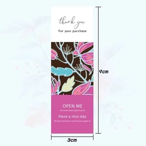 Rectangular floral seal sticker with OPEN ME text for gift boxes and bakery packaging 9x3cm