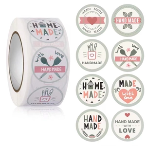 Detail of 8 different hand made round adhesive seal stickers for bakery packaging