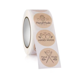 Roll of brown kraft paper Hand Made stickers for bakery and gift packaging