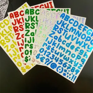 Detailed view of colorful holographic laser alphabet and number stickers with glitter effect