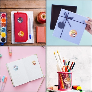 Applications of round animal reward stickers on school supplies and gift boxes