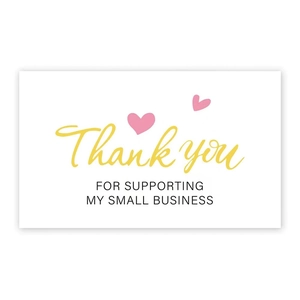 Detail of pink heart thank you card for small business support with gold lettering