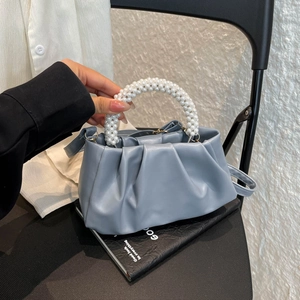 Elegant morandi blue pleated cloud bag with pearl handle and detachable strap