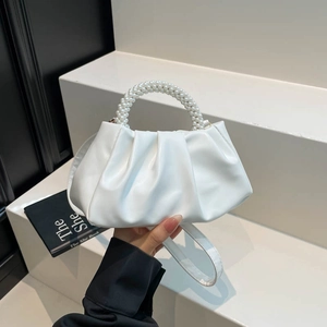 Elegant white pleated cloud bag with pearl handle and shoulder strap for women