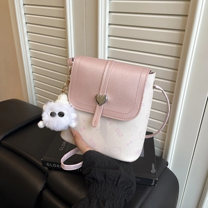 Pink and beige bucket bag for women with heart-shaped buckle and plush mascot