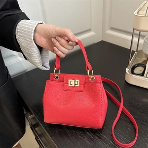 Elegant red litchi texture crossbody bag with gold turn-lock for evening party wear
